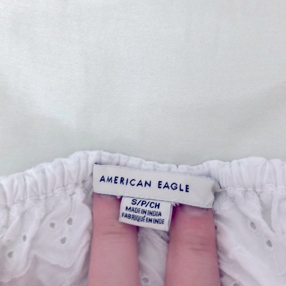 Cropped, white flare tee with detailing. - Picture 5 of 5